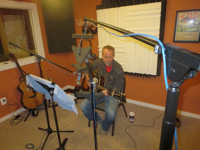 Clark Hansbarger in the cockpit working on "Tammy Lee."